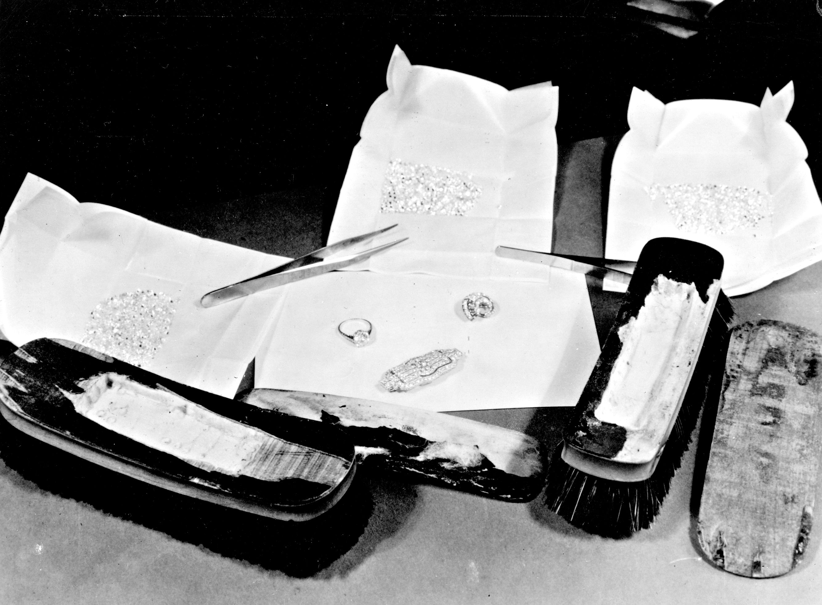 Diamonds concealed in a hollowed out broom handle, discovered by Customs inspectors on board the Queen Elizabeth. (CBP historical collections, 1949)