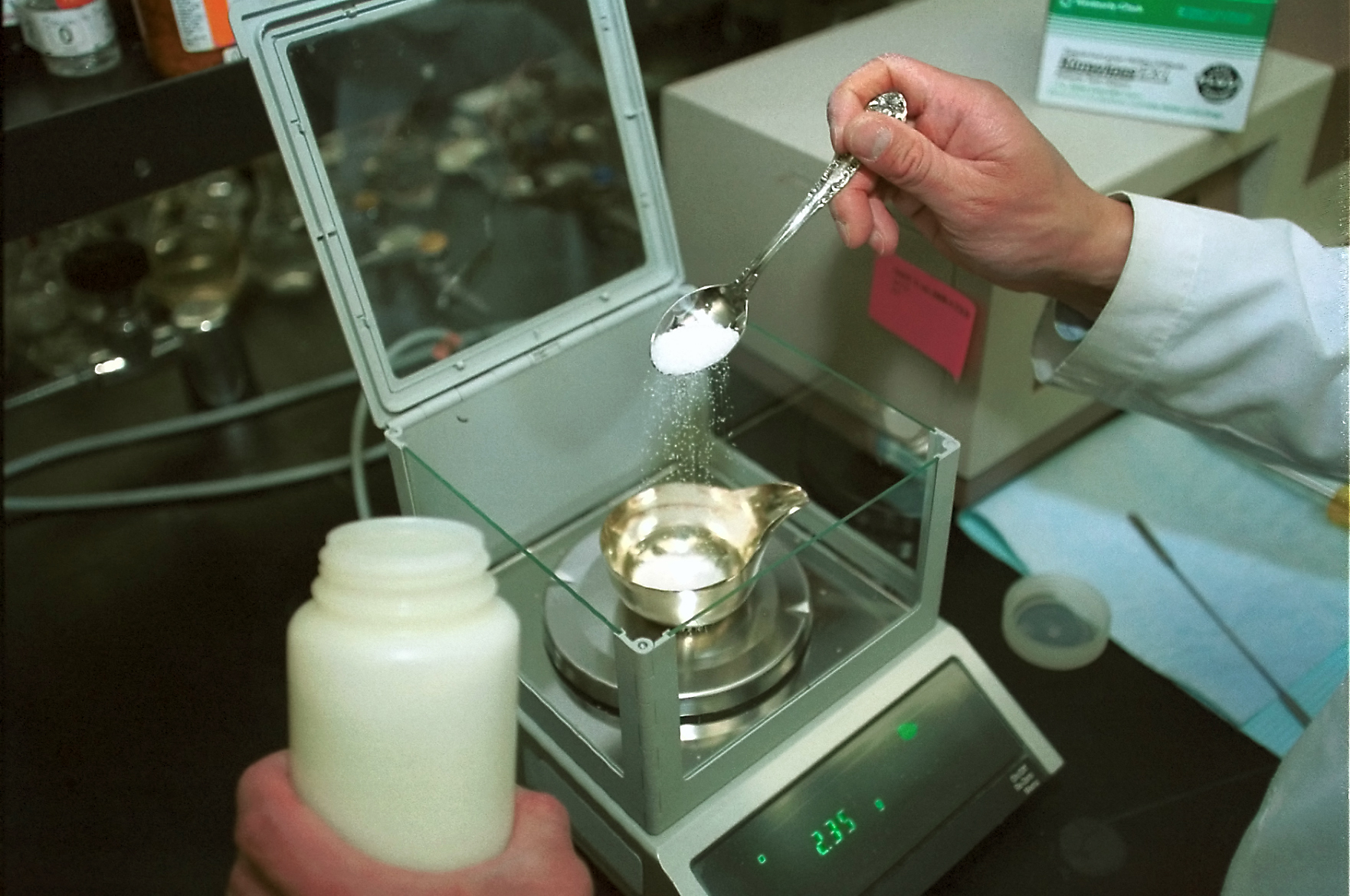 Precise amounts of drugs are measured before testing.