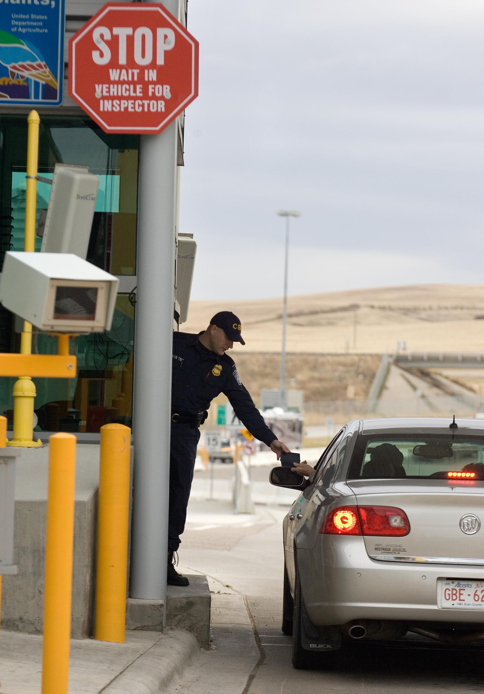 CBP officer checks documents at the Sweetgrass MT point of entry