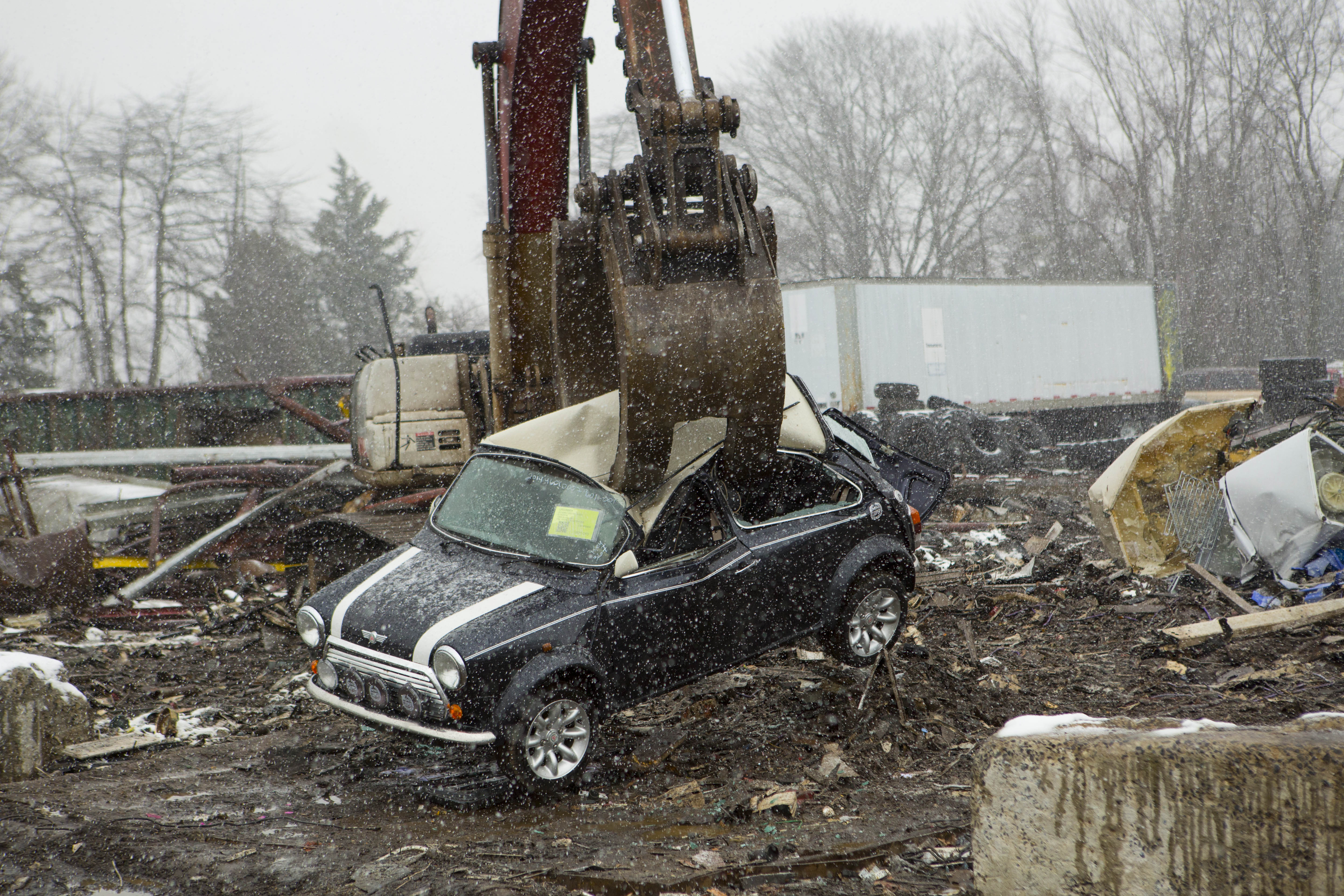 U.S. Customs and Border Protection in conjunction with British Authorities destroy a Mini Cooper that had many violations related to importation. Photo Credit: James Tourtellotte.