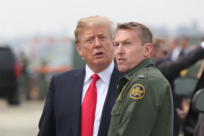 President Trump discusses border security with San Diego Border Patrol Sector Chief Patrol Agent Rodney Scott during a visit to the border wall prototypes and mockups. Photo by Border Patrol Agent Tim Tucciarone