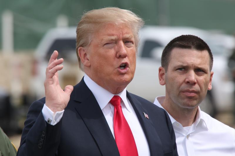 President Trump makes a point about border security while CBP Acting Commissioner Kevin McAleenan listens during a visit to the border wall prototypes and mockups in San Diego on Tuesday. Photo by Border Patrol Agent Tim Tucciarone