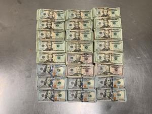 Stacks totaling $198,902 in unreported currency seized by CBP officers at Pharr International Bridge during an outbound examination.