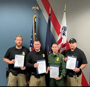 Picture from left to right are AMO Agents Kerry Martinick, Matthew Kimmel, USBP Agent Julio Leon-Gonzalez, and AMO Agent Ryan Whitehead. Not present is AMO Agent Kane Sprague.