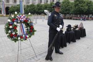 A CBP Officer is shown standing watch during the Valor Memorial and Wreath Laying Ceremony at CBP Headquarters on May 13, 2011.
