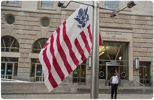 The CBP ensign being raised at the Ronald Reagan Building in Washington, D.C.
