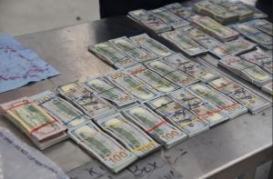 Stacks containing $248,531 in unreported currency seized by CBP officers during an outbound examination at Juarez-Lincoln Bridge..