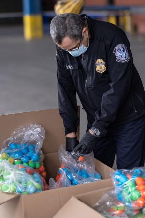 A CBP agriculture specialist inspects cascarones at Laredo Port of Entry.