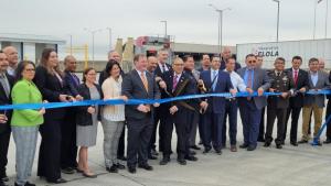 Jason_at_Cutting_Ribbon_at_World_Trade_with_other_people_surrounding