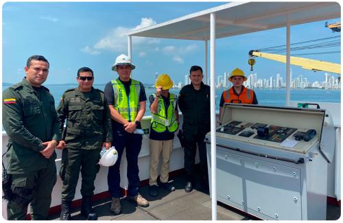 CSI Cartagena officers Daniel Castro and Jessica Valentin-Castro, with Colombian Antinarcotics Police on a vessel touring the Cartagena Bay.