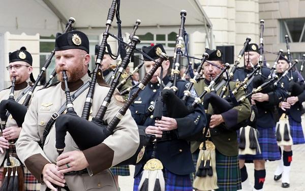 Members of U.S. Customs and Border Protection’s Pipe and Drum Corps plays the bagpipes during the solemn Valor Memorial and Wreath Laying Ceremony at headquarters in Washington, D.C., May 12. CBP photo