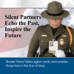 A Border Patrol agent holds the Silent Partner card of a fallen agent.