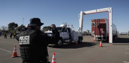 A CBP officer scans vehicles at Super Bowl LVII.