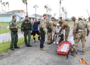 Rio Grande Valley Sector Border Patrol Special Operations Agents assist disaster survivor trapped on second floor of his home.
