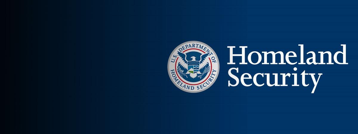 DHS seal and the words 'Homeland Security' on a blue background