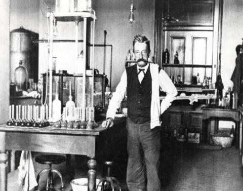Chief Chemist Walter L. Howell stands in the laboratory in the U.S. Custom House in New Orleans, Louisiana. This Customs laboratory was established in 1900.