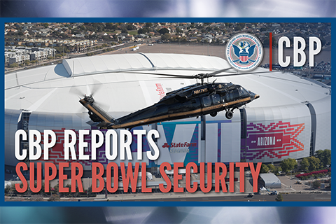 A blackhawk helicopter flies in front of the Super Bowl stadium in Phoenix, AZ. CBP reports Super Bowl Security 