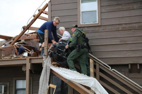 Rio Grande Valley Sector Border Patrol Special Operations Agents assist disaster survivor trapped on second floor of his home.