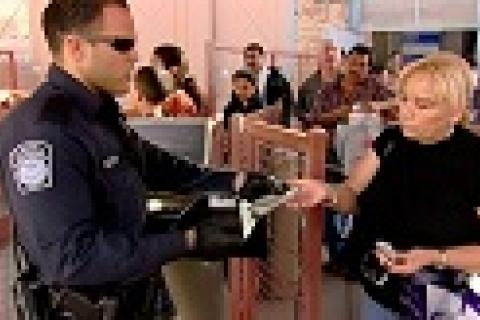 CBP Officer processing travelers