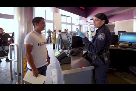 CBP Officer interviews a person 
