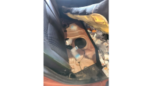 Illegal pharmaceutical items found under the back seats of a vehicle