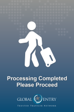 Portal screen message to traveler reading “Processing Completed Please Proceed”