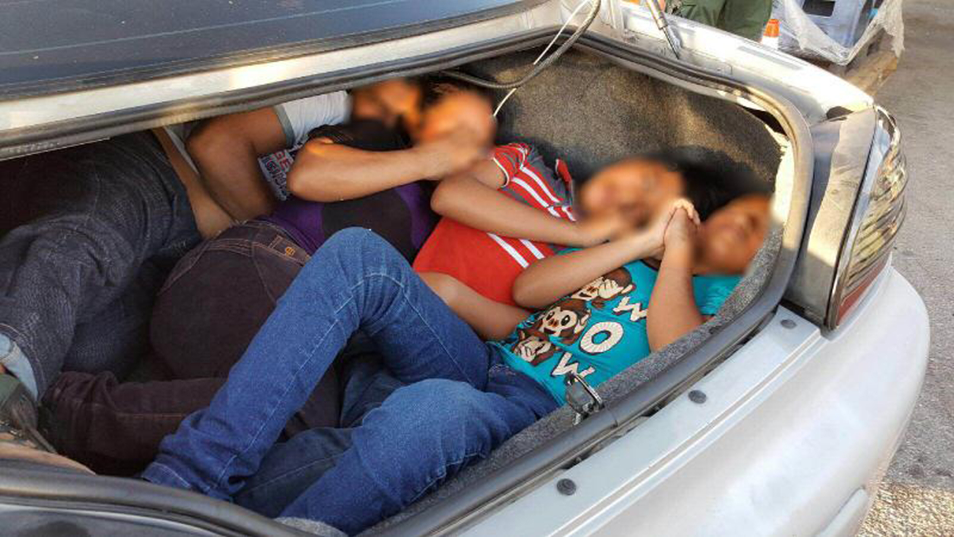 Photo of illegal aliens stashed in a trunk