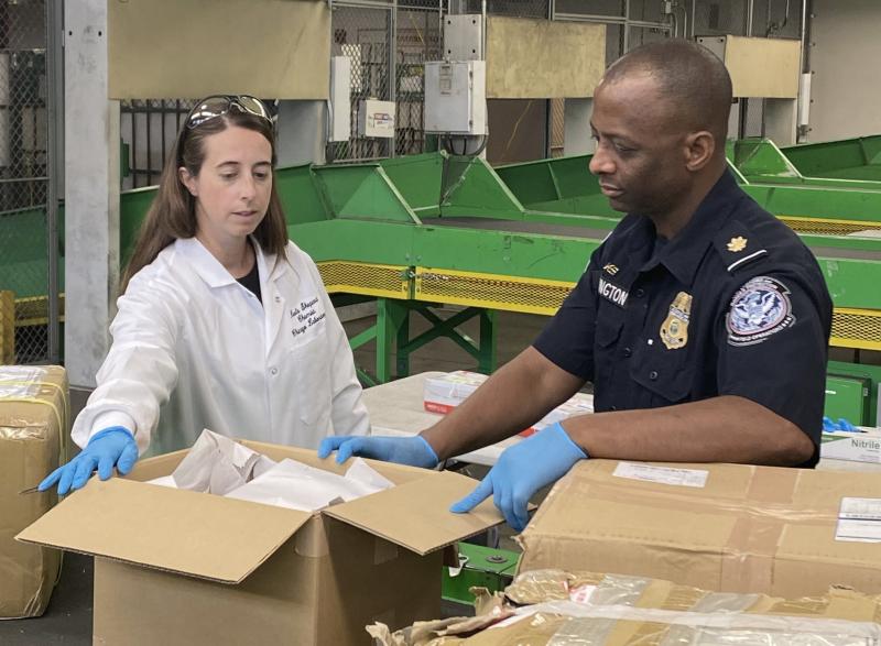CBP scientists work in a forward operating lab