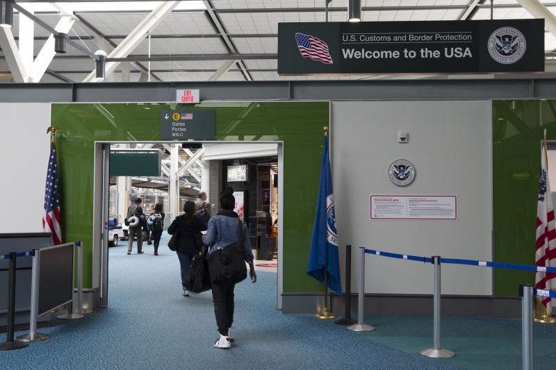 Travelers entering the US Customs Border Protection area at the airport