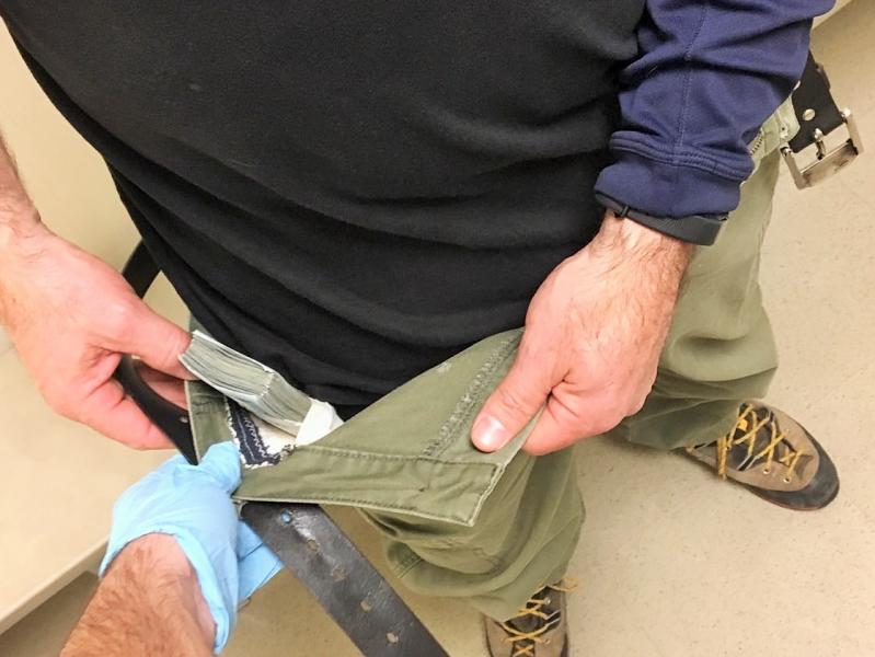 Traveler found with $10K sewn into the lining of his pants at Boston Logan Airport.