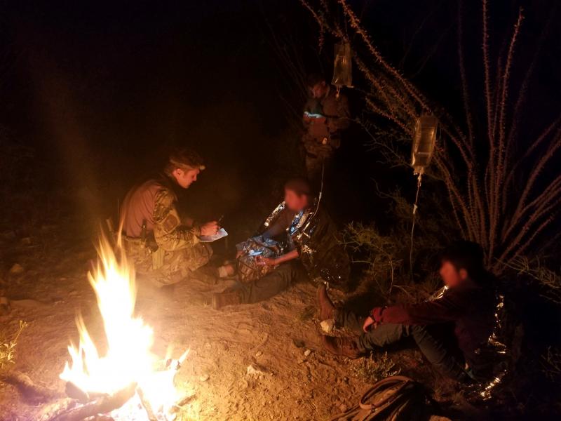 Borstar agents provided with pair intravenous fluids and built a small fire to help stabilize the shivering men in Arizona May 2, 2019.