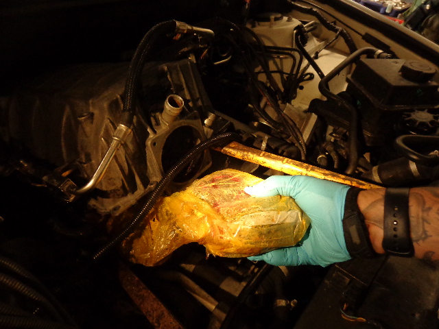 Several packages of heroin and meth found in a vehicle’s intake manifold by Border Patrol.