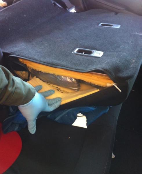 A search of the vehicle revealed 17 packages hidden inside the vehicle’s rear passenger seat.  