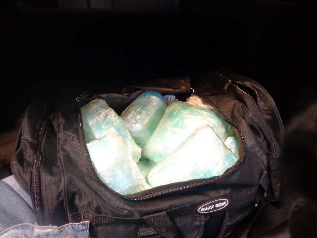 A woman driving a Kia Forte on I-5 was arrested for smuggling meth.  20 plastic-wrapped bundles weighing more than 48 pounds with an estimated street value of $92,986 was seized.
