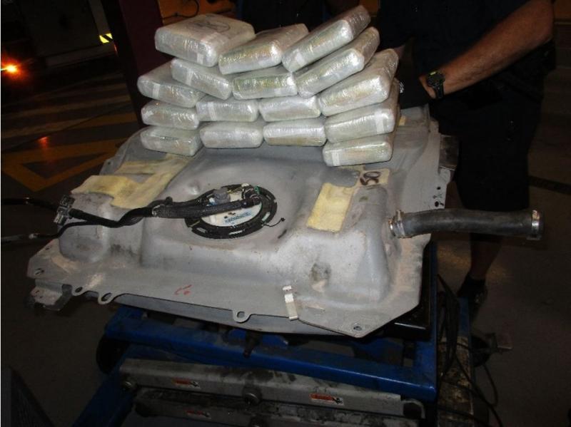 CBP officers at the San Ysidro port of entry found 32 wrapped packages of methamphetamine concealed within the gas tank and the rocker panels of a car on Thursday, October 12.