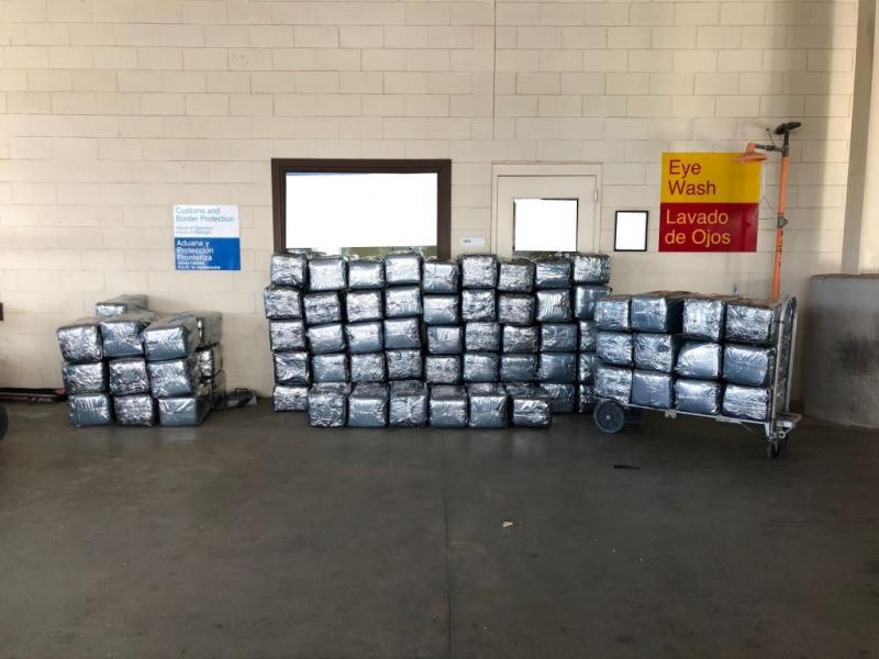 CBP officers extracted 81 large wrapped packages of marijuana comingled within the shipment of wood furniture, weighing over 2,400 pounds with an estimated street value of $990,000.