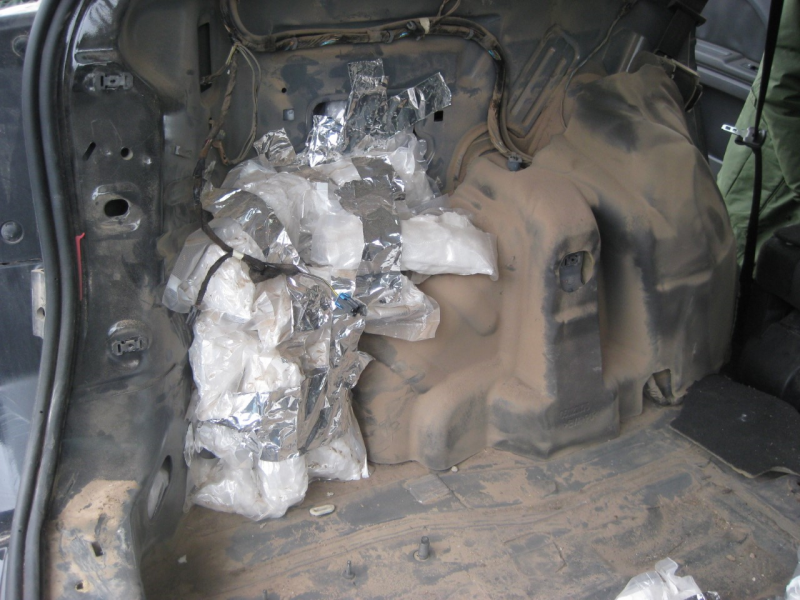 The narcotic bundles were located in the vehicle’s rear-quarter panels and are valued at more than $98,000.