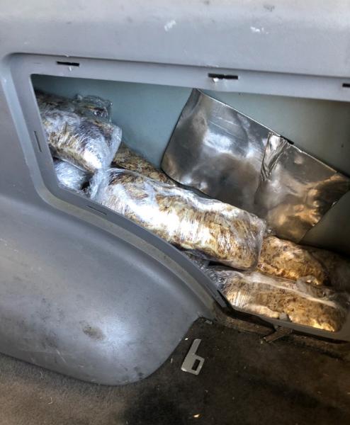 Border Patrol agents discovered a total of 76 packages concealed in the dashboard, all four doors and the two rear quarter panels of the vehicle.