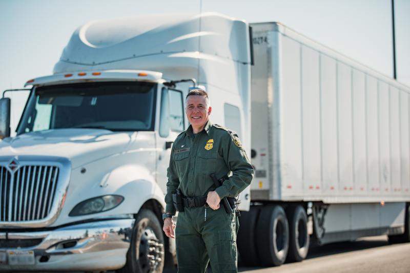 El Centro Sector Chief Patrol Agent Gregory K. Bovino stands in front of a  seized tractor-trailer used during the smuggling event on Monday.
