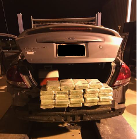 Agents pulled 24 packages of cocaine from car bumpers.