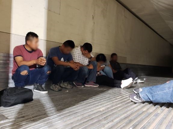 Agents stop tractor trailer and find nine undocumented immigrants inside.