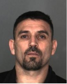 Martel Valencia-Cortez is wanted after assaulting a federal agent; he is at large and considered armed and dangerous.