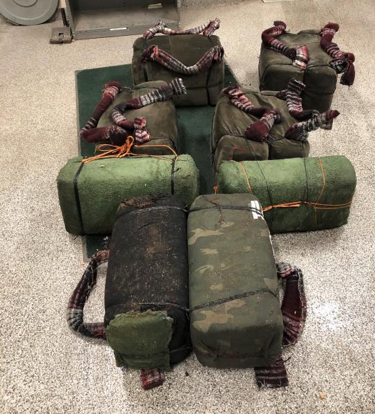Agents discovered these burlap backpacks filled with 244 lbs. of marijuana.