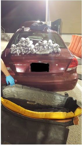 Border Patrol discovers meth and heroin hidden inside a vehicleâ€™s back seat .