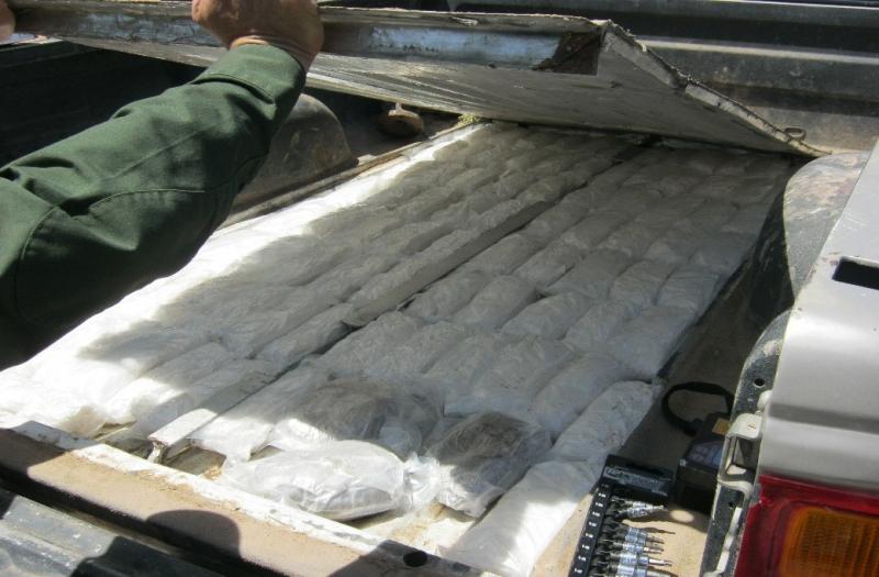 Following a K-9 alert, agents discovered 85 bundles of meth and three bundles of heroin hidden in the rear of a Ford truck.