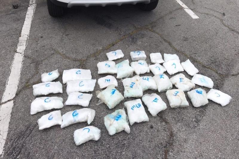 A K-9 alert, agents discovered packages of meth hidden inside a vehicle’s spare tire.
