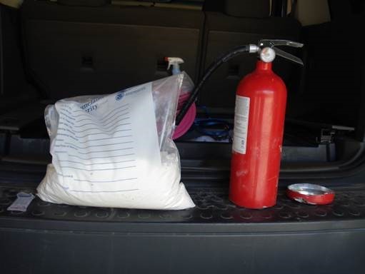The 6.83 pounds of cocaine were stuffed inside a fire extinguisher in the cargo area.