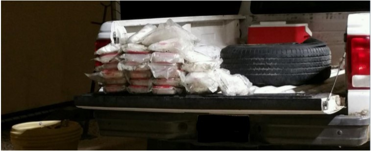 Agents pulled 26 packages of meth from a spare tire; man arrested.