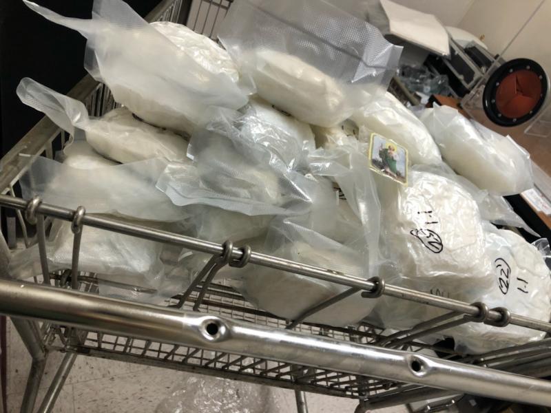 Agents pulled 25 bundles of meth from inside a dashboard.