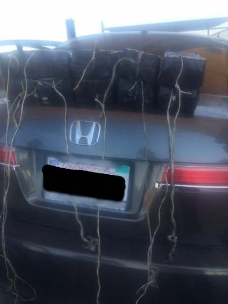 Agents pulled 10 packages of meth hidden inside car's rocker panels.